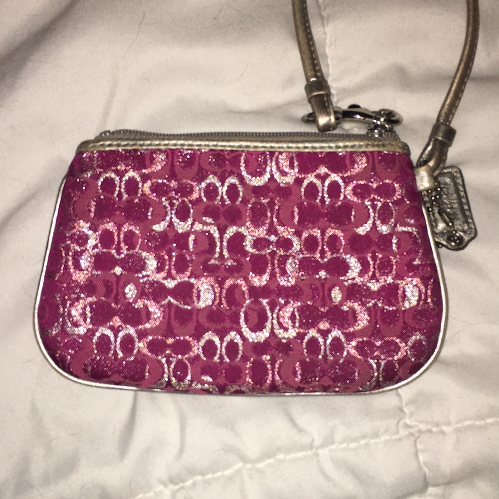 Small pink Coach wristlet
